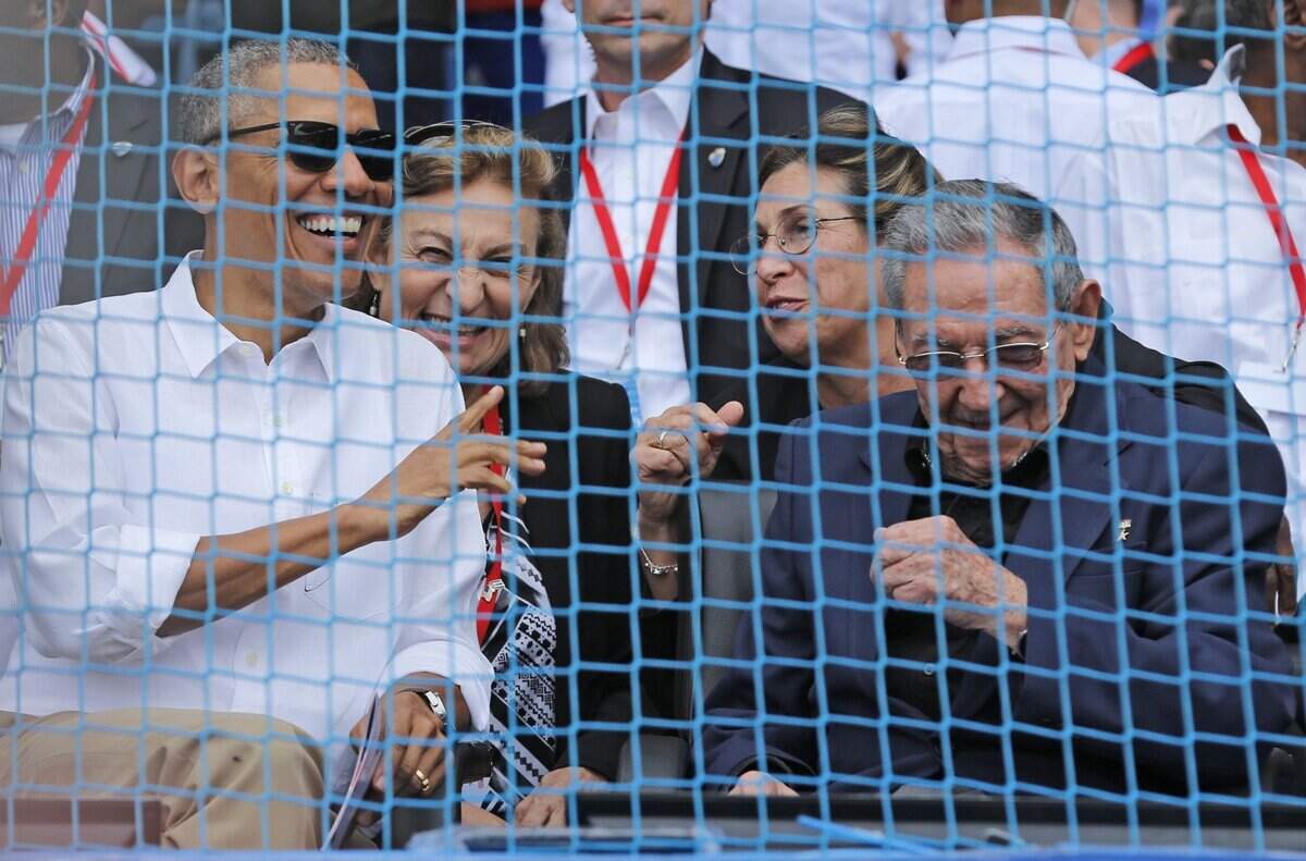 President Barack Obama with Cuban leader Raul Castro at the Estadio Latinoamericano for baseball game between the Tampa Bay Rays and the Cuban National team in Havana on Tuesday, March 22, 2016.